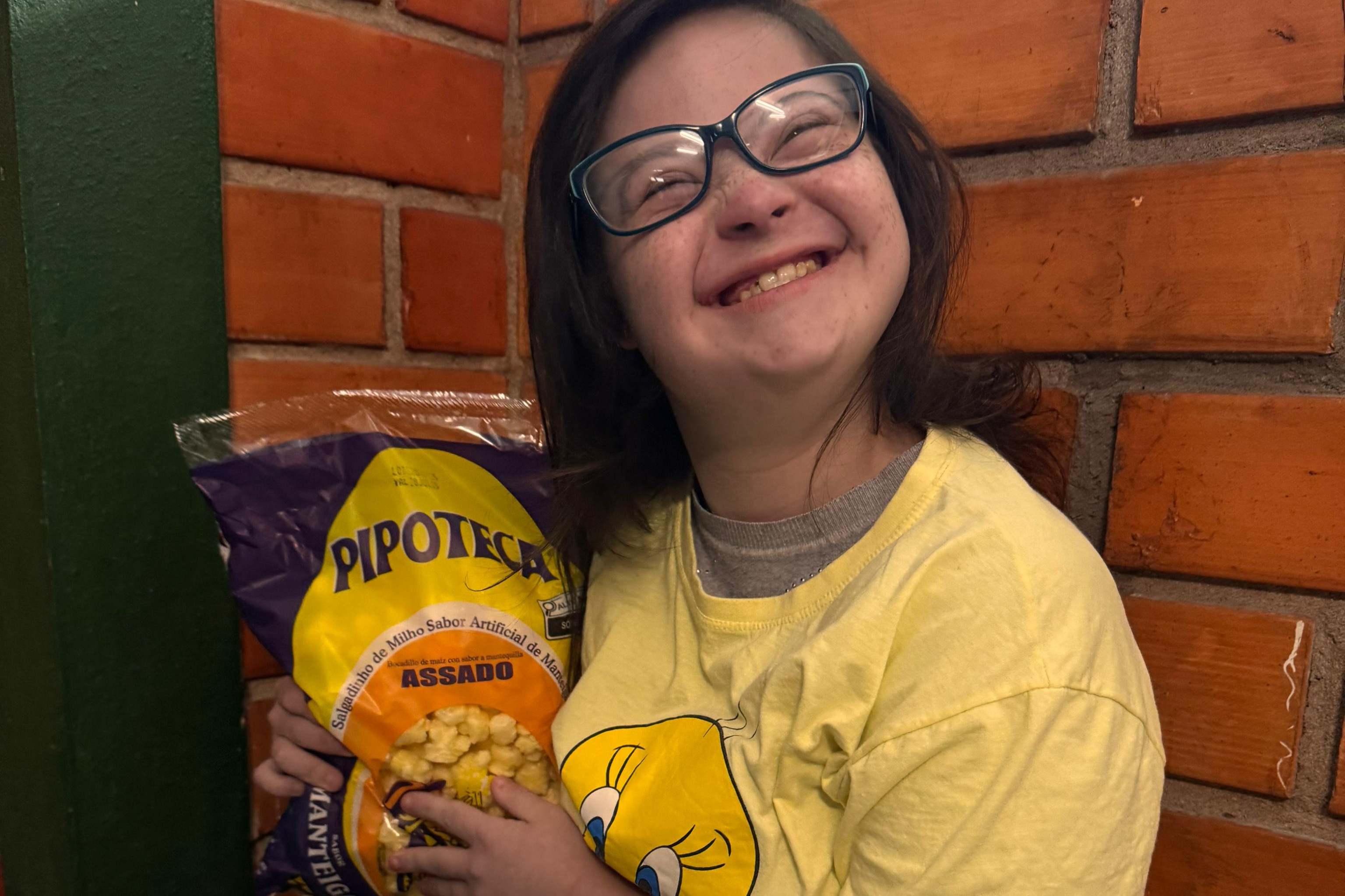 Aluna do Instituto na hora do lanche